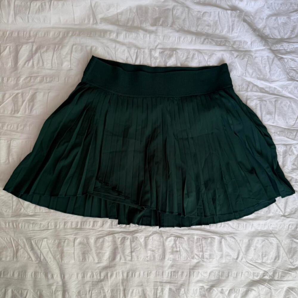 Green pleated tennis skirt
